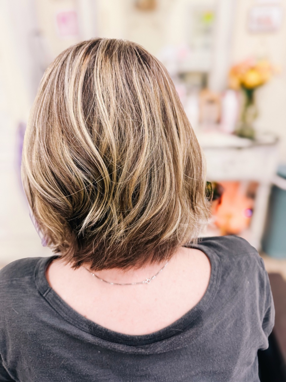 Dimensional blonde color by Amanda